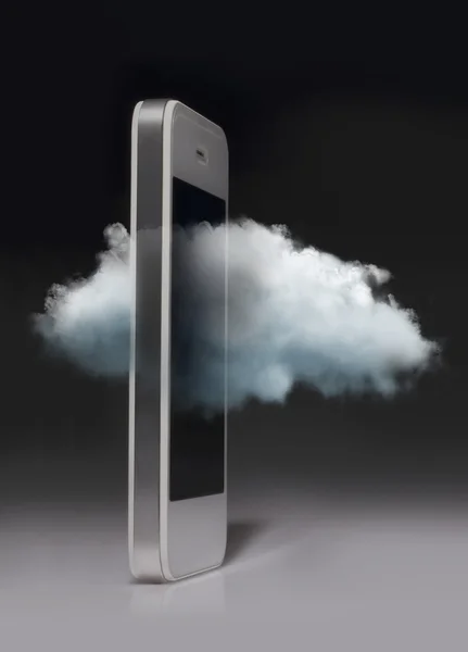 Karanlık arkasında izole smartphone ile bilgisayar teknoloji bulut — Stok fotoğraf