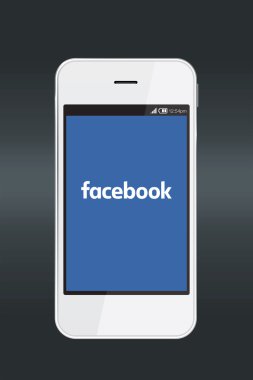 Facebook logo üstünde smartphone perde