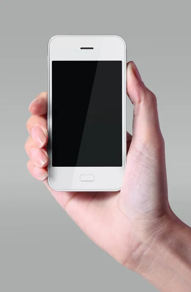 Weißes Smartphone mit isolierter Hand auf grauem Hintergrund. — Stockfoto