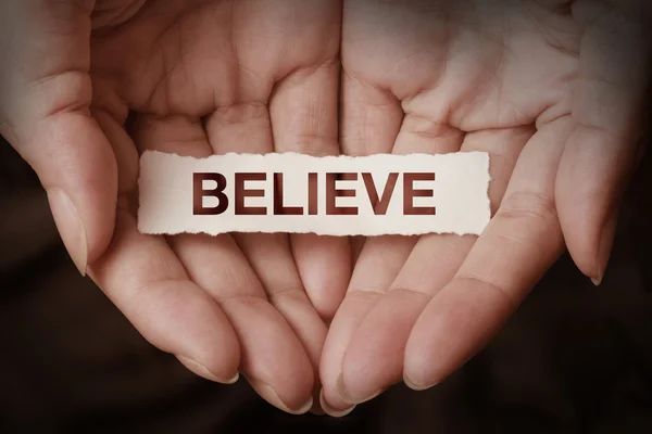 Believe text on hand — Stock Photo, Image