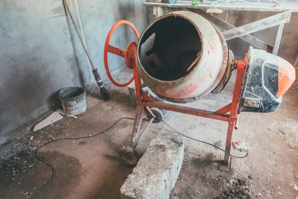 stock image Cement concrete mixer at a construction site.