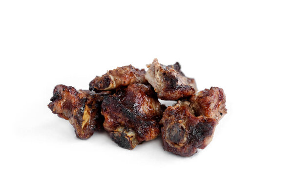 Grilled pork ribs isolated on white background.