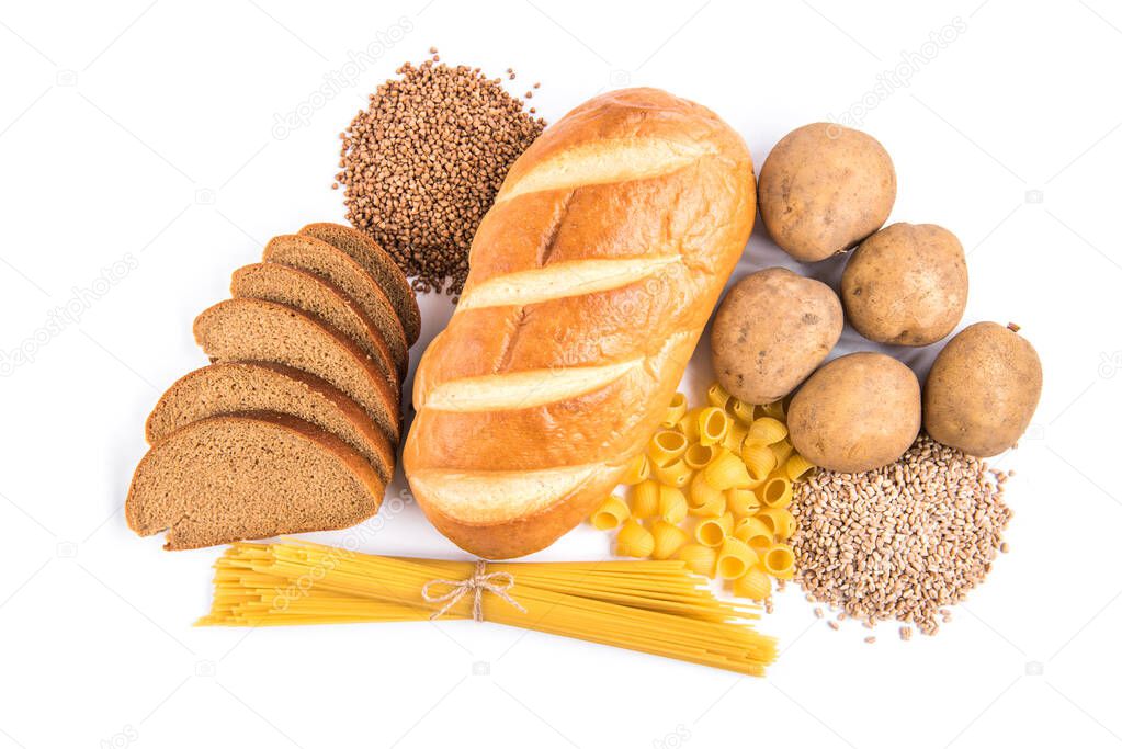 Carbohydrates of loaf, potatoes and groats isolated on white background.