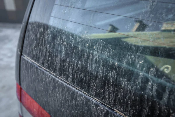 Dirty windows of car.