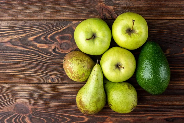 Aguacate Pera Manzana Verde Sobre Fondo Madera Oscura —  Fotos de Stock