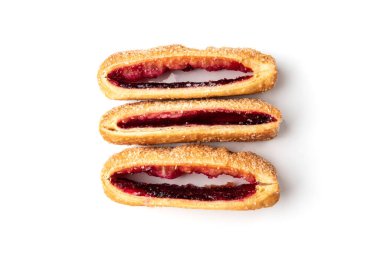 Puff pastry with cherry or raspberry jam isolated on white background.