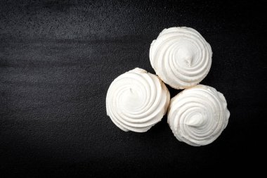 Russian marshmallow on black background.