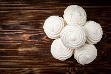 Russian marshmallow on dark wooden background.