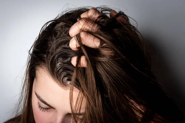 Young Woman Dirty Greasy Hair Gray Background — Stock Photo, Image