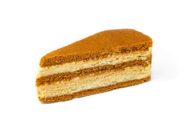 Beyaz arkaplanda izole edilmiş ballı kek dilimi.