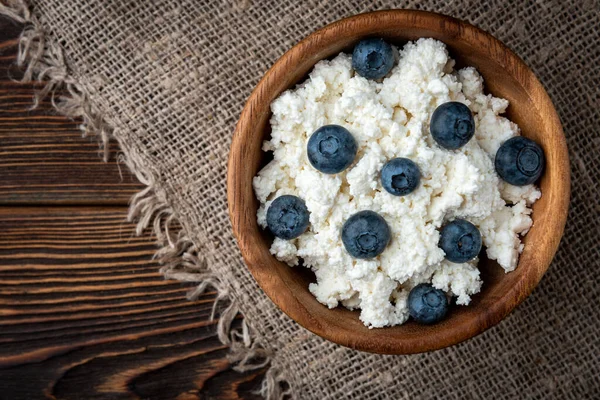 Cottage Cheese Blueberry Wooden Bowl Spoon Dark Wooden Background — Foto de Stock