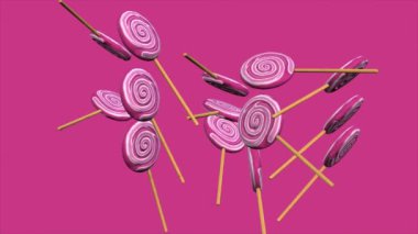 4K animasyon - Pembe arka planda dönen tahta çubuklu lolipop şekeri 