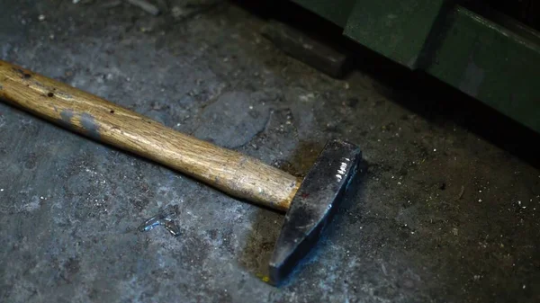 Close Up Of Old Tools .Old Rusty Hammer and Pliers On Iron Sheet