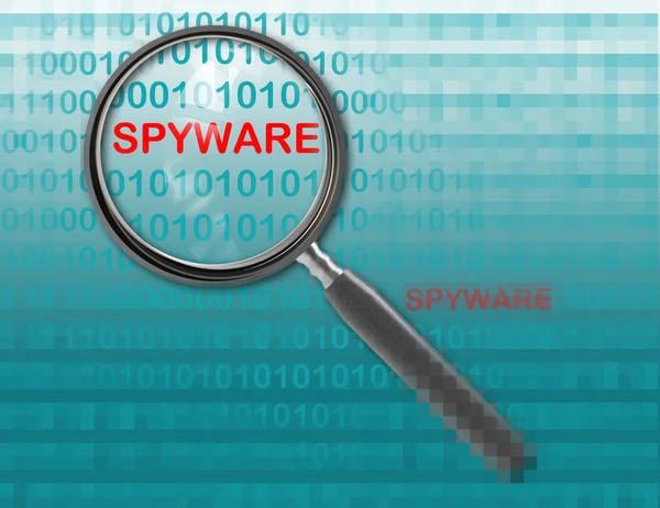 Close up of magnifying glass on spyware — Stock Photo, Image