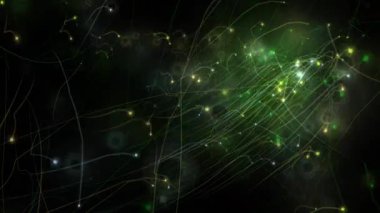 Siyah zemin üzerinde kuyrukları yüzen parlak yeşil ve sarı parçacıkların soyut animasyonu
