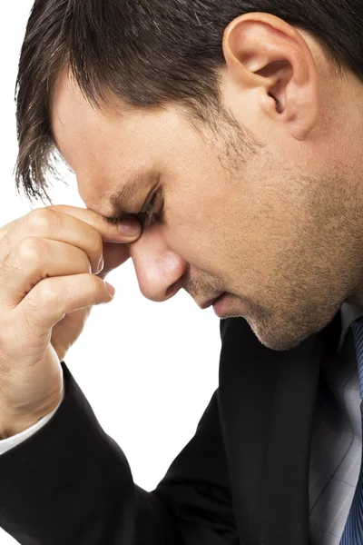 Young businessman having terrible  headache — Stock Photo, Image