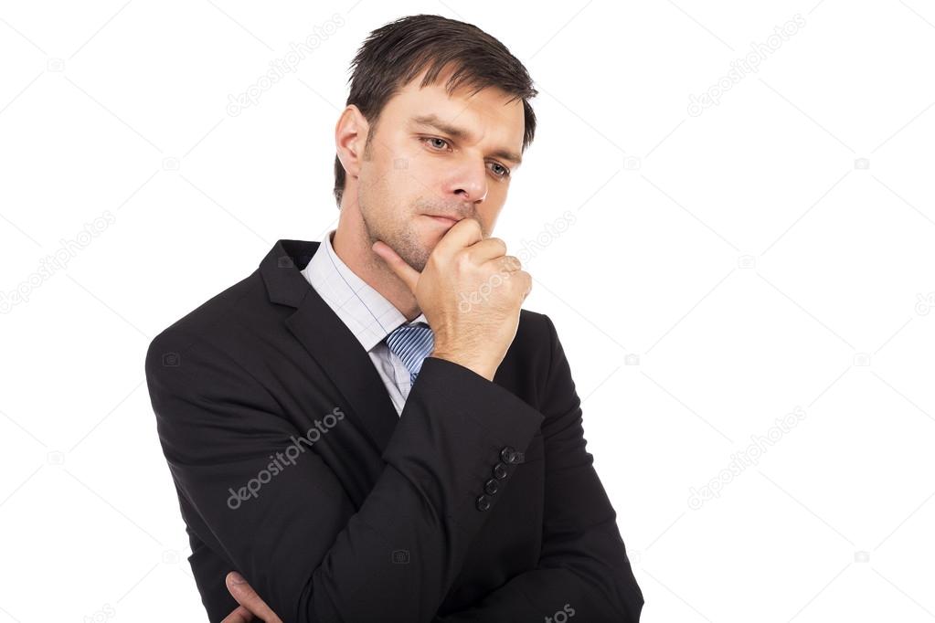Portrait of young thoughtful young businessman