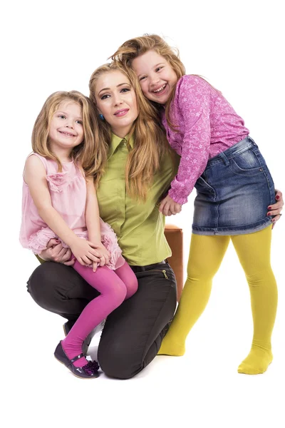 Portrait of happy mother with her lovely daughters — Stock Photo, Image