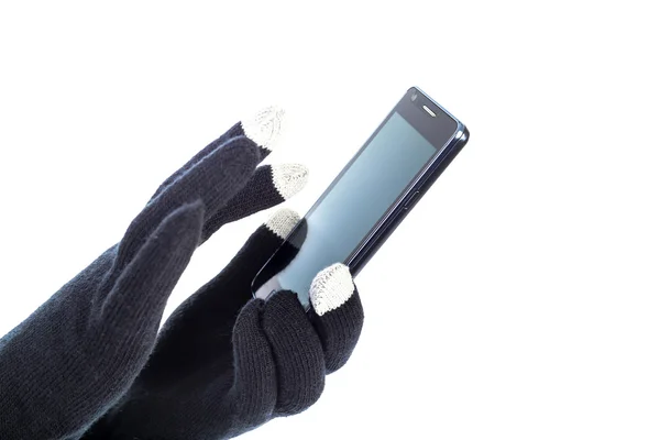 Closeup of woman hands with touchscreen gloves holding smart pho — Stock Photo, Image