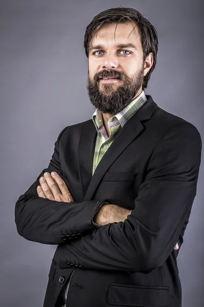 Young businessman with arms folded isolated over — Stock Photo, Image