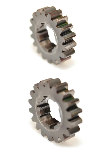 Two gears isolated with selective fokus. — Stock Photo, Image