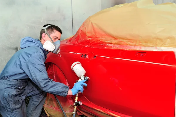 Painting red car. — Stock Photo, Image