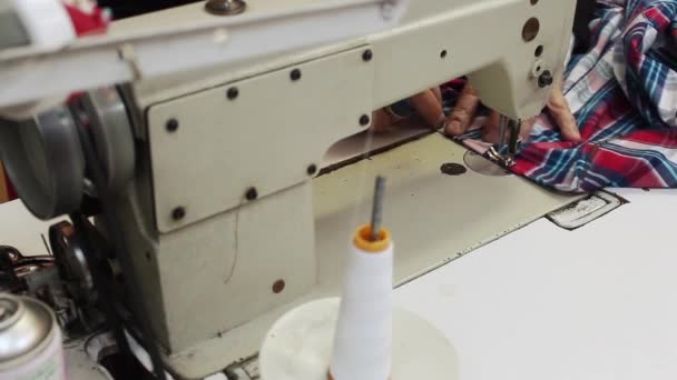 Tailor sews fabric sewing workshop — Stock Video