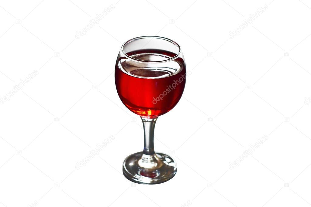 Glass of red wine on a white background.