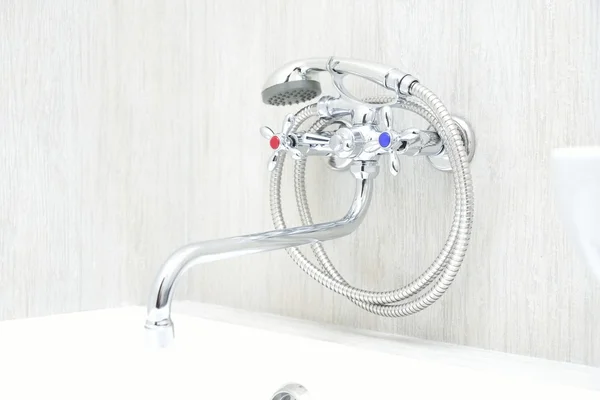 Chrome faucet with showerhead — Stock Photo, Image