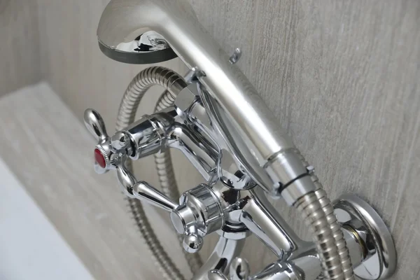 Chrome faucet with showerhead — Stock Photo, Image