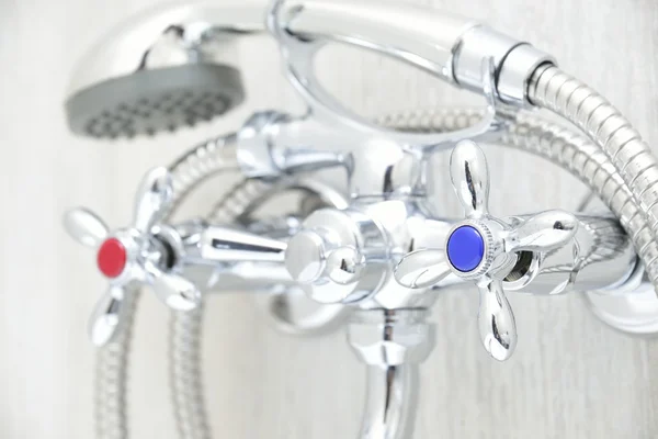 Chrome faucet with showerhead — Stock Photo, Image