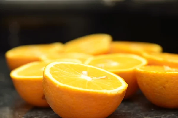 Oranges over black — Stock Photo, Image