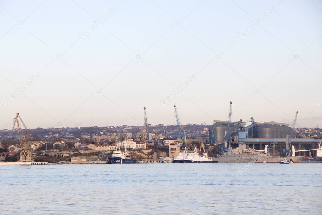Military and patrol ships moored at berths in Sevastopol Bay, Crimea