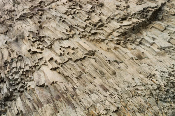 Ribbed texture of volcanic rocks on the cliff of Cape Fiolent — Stock Photo, Image