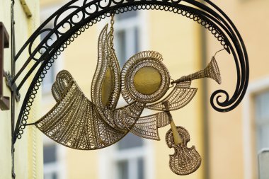 Metal mail angel with fife and violin in Slovakia clipart