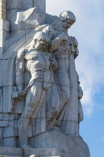Sculpture on the basis of the Freedom Monument in Riga — Stock Photo, Image