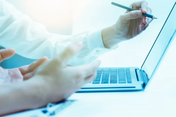 Business documents on office table with laptop computer,document