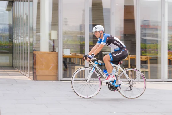 Marina bay, Singapore - Sep 9: Man playing on bike for health. on Sep 9, 2015 in Marina bay,Singapore.