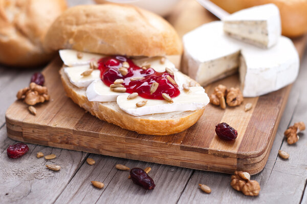 bread served with camembert and cranberry.