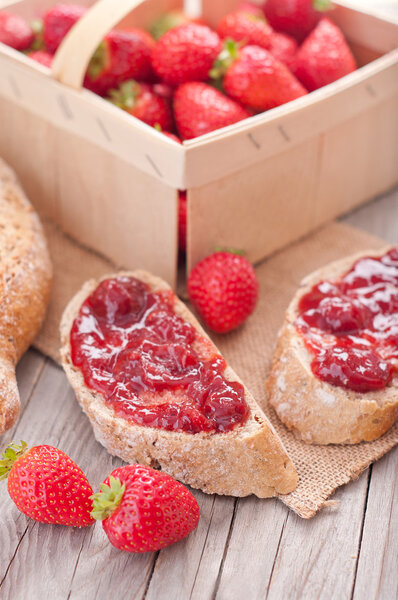 sweet strawberries jam on bread slice.