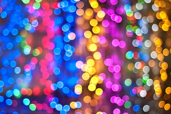 Color Bokeh against a dark background for use at graphic design. — Stock Photo, Image