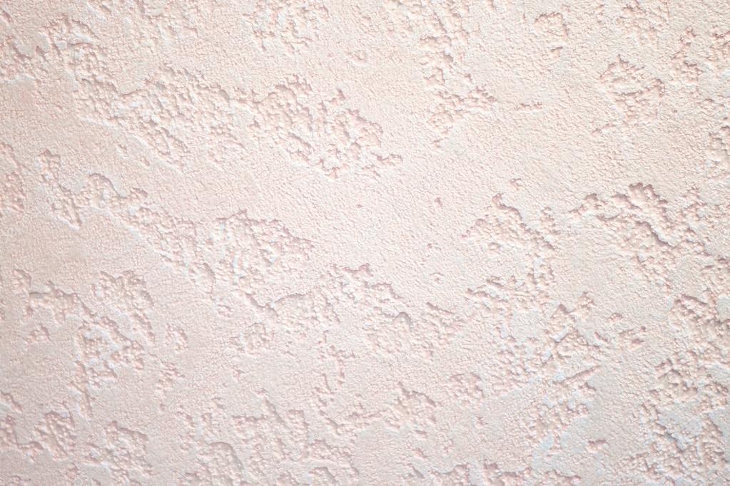 Plastered wall in small grain.