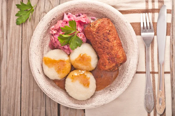 Traditional Polish, Silesian dish. Meat roulade with potato dump