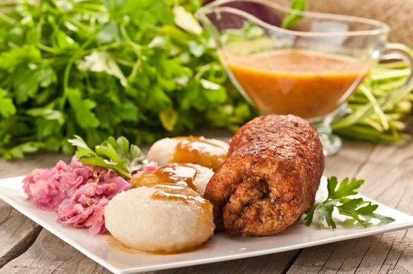 Traditional Polish, Silesian dish. Meat roulade with potato dump — Stock Photo, Image