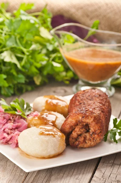 Traditional Polish, Silesian dish. Meat roulade with potato dump — Stock Photo, Image