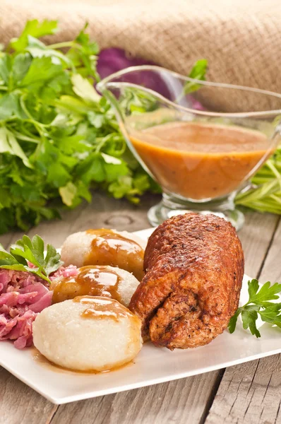 Traditional Polish, Silesian dish. Meat roulade with potato dump — Stock Photo, Image