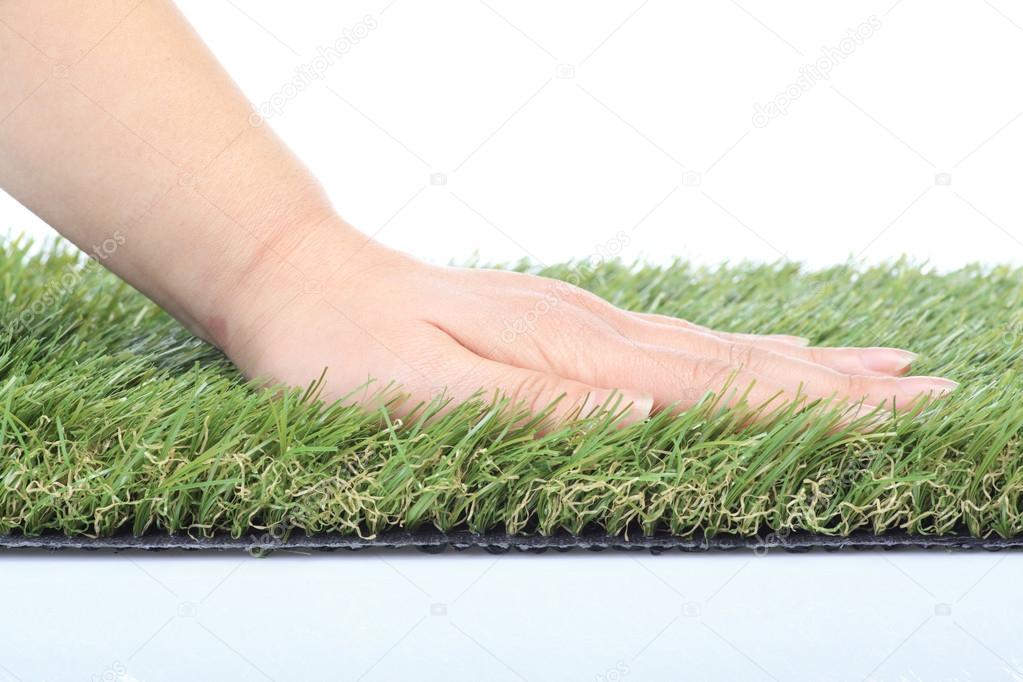 Plastic lawn on a white background