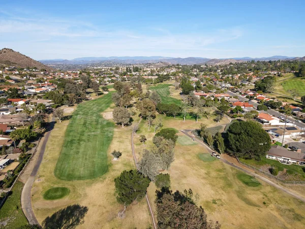 Aerial view of golf in green valley — Stock Photo, Image
