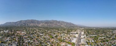 Aerial view above Pasadena neighborhood in California clipart