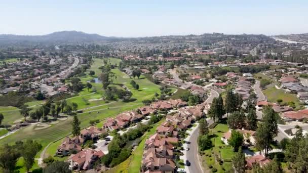 Aerial view of residential neighborhood surrounded by golf and valley during sunny day in Rancho Bernardo — Stock Video